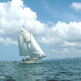 Classic Schooner Sailing Yacht under full sail off Phuket