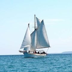 Classic Schooner Sailing Yacht heading out from port